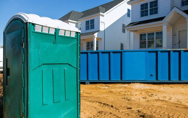 dumpster and portable toilet at a construction site project in Marietta GA